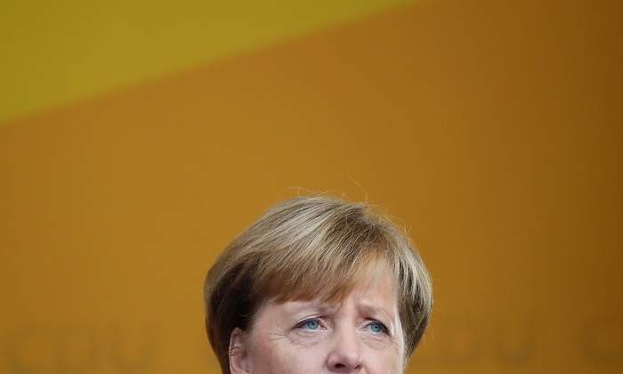 merkel-cortada-mitin-reuters.jpg