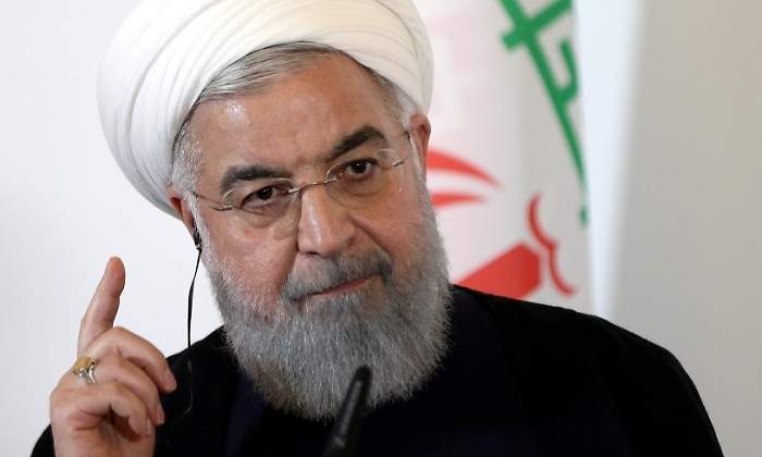 rohani-hasan-iran-bandera-reuters.jpg