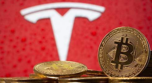 Tesla deja de aceptar Bitcoin por su impacto negativo al medio ambiente 2 490x tesla bitcoin reuters