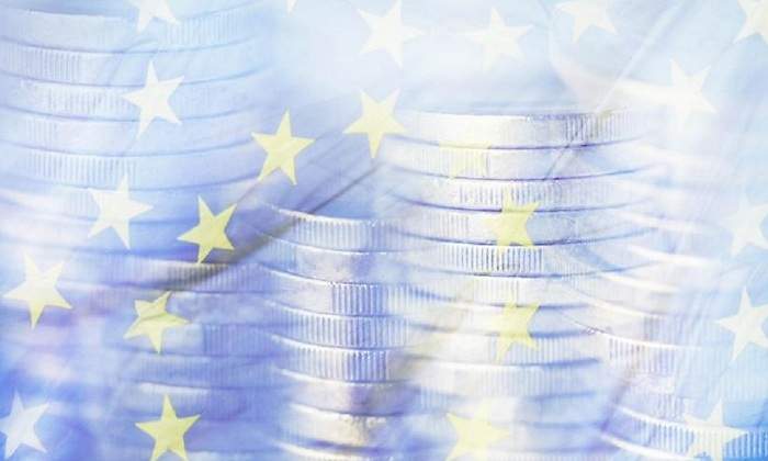 1200-x-655-Moneda-de-euro-y-bandera-europea-iStock.jpg