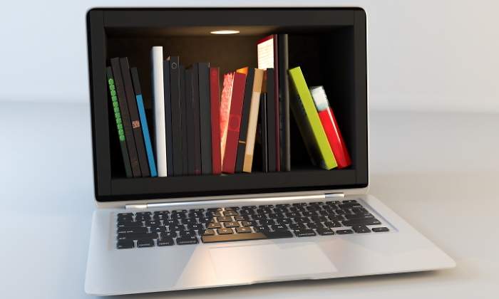 portatil-libros-dreamstime.jpg