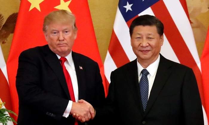 trump-xi-manos-banderas-reuters.jpg