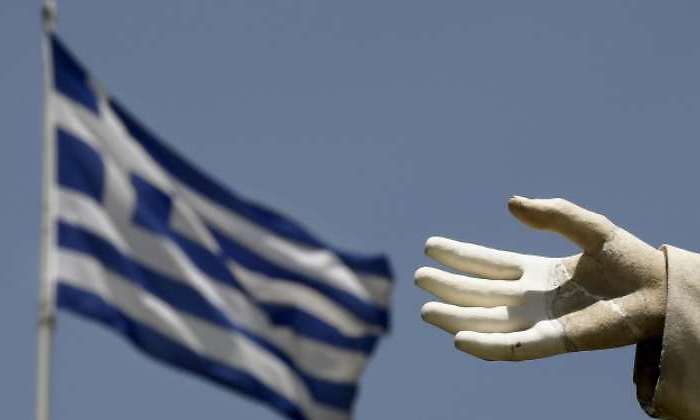 Grecia-bandera-mano.jpg