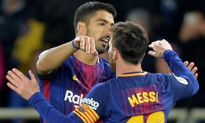 messi-suarez-2018-celebran-reuters.jpg