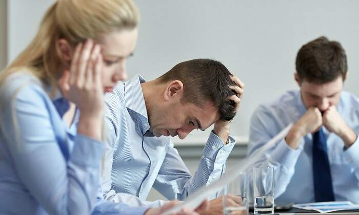 trabajadores-tristes-dreamstime.jpg
