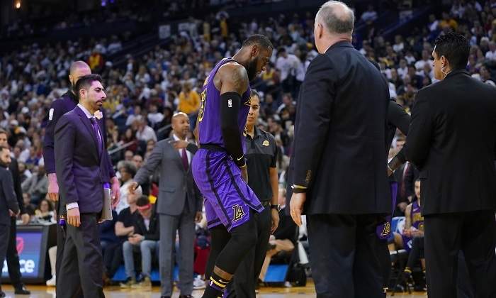 lebron-james-lesion-warriors-navidad-usatoday.jpg