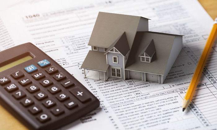 vivienda-papeles-calculadora.jpg