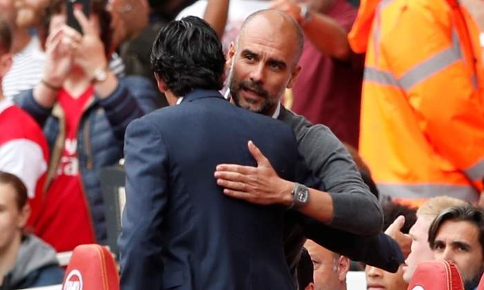 guardiola-emery-reuters.jpg