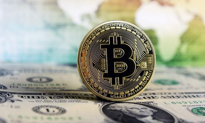 a cuanto equivale 1 dolar en bitcoin