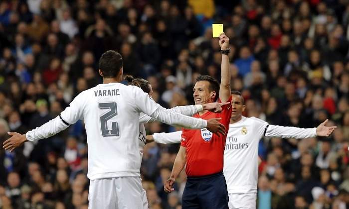 Varane-Estrada-FErnandez-amarilla-2016-efe.jpg