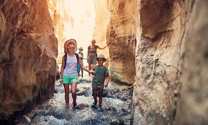 family-hiking-through-rivier-in-andalusia-spain-picture-id844084632.jpg
