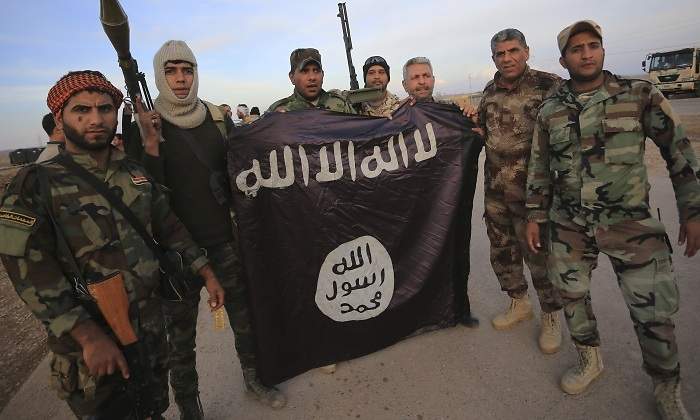 milicianos-bandera-estado-islamico-reuters.jpg