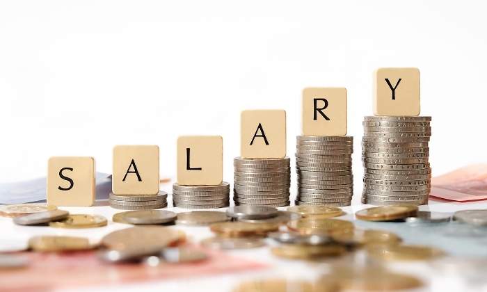 salario-monedas-fondo-blanco-dreamstime.jpg