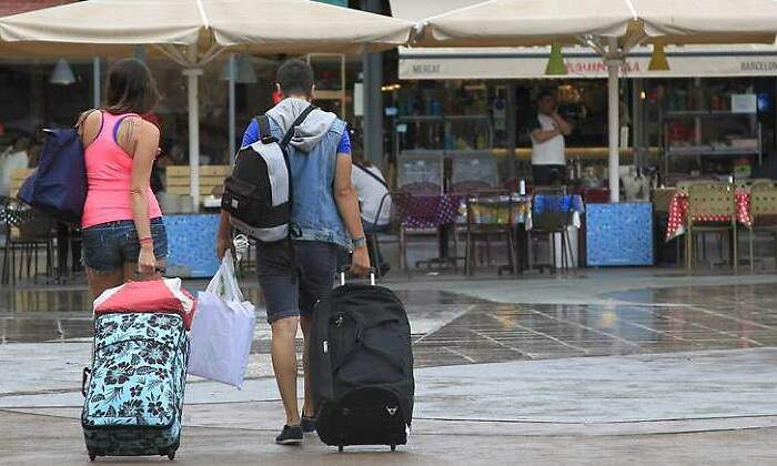 turistas-maletas-770-efe.jpg