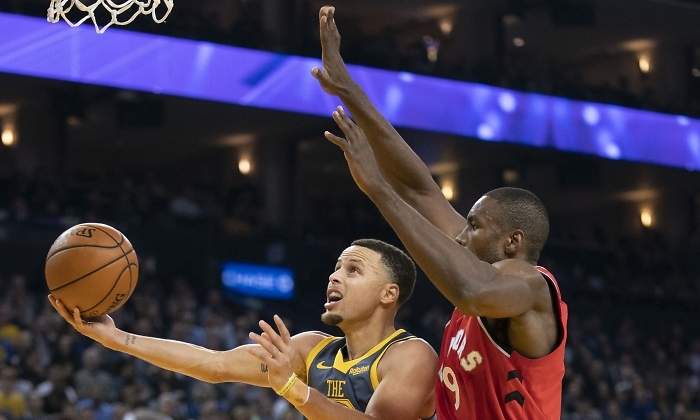 ibaka-curry-reuters.jpg
