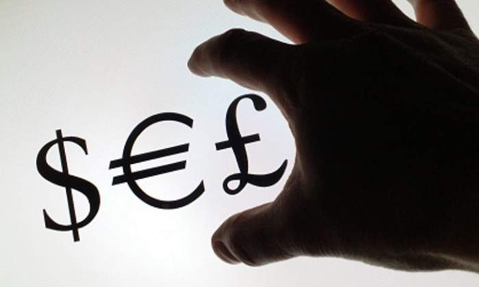 libra-dolar-euro-mano.jpg