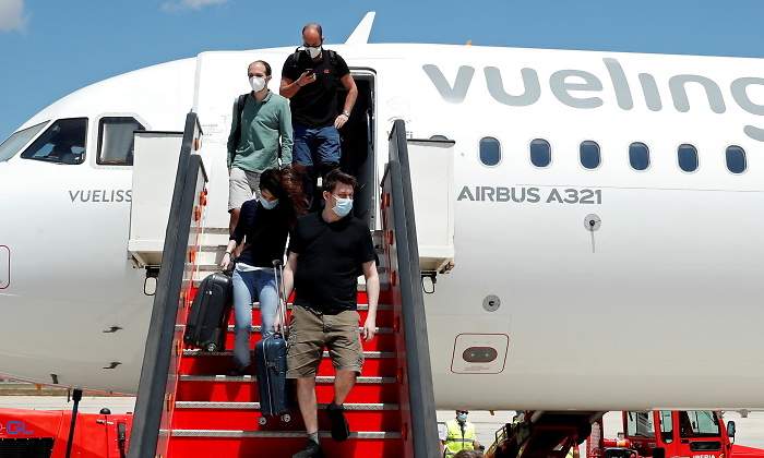 baleares-turistas-coronavirus-aeropuerto-reuters.jpg