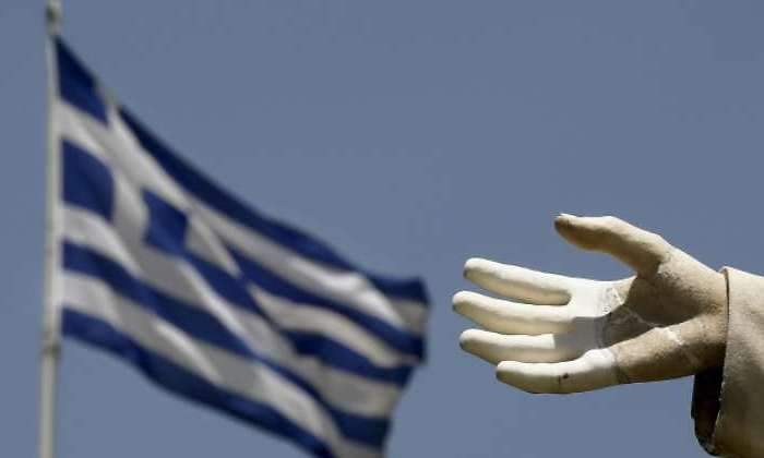 Grecia-bandera-mano.jpg