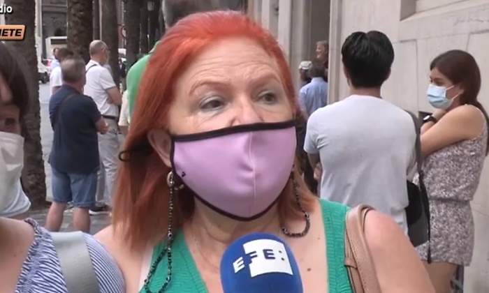 mujer-pesetas-euros.jpg