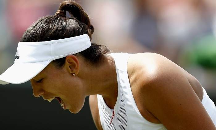 muguruza-grita-kerber-wimbledon-reuters.jpg