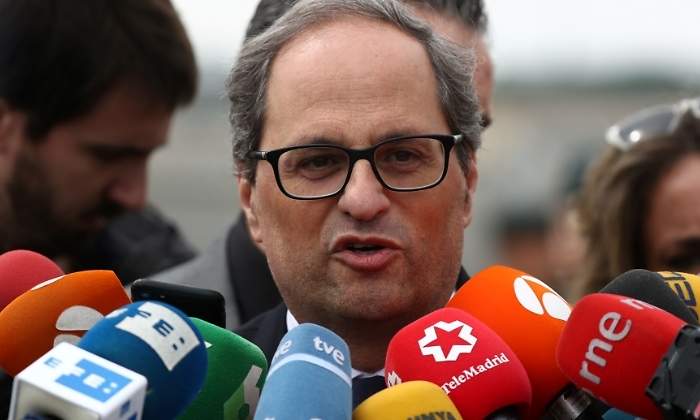 torra-quim-microfonos-reuters.jpg