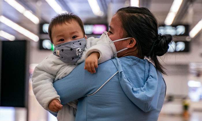 coronavirus-madre-nino-brazos-getty.jpg