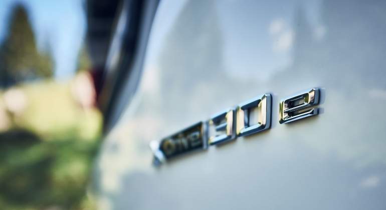 Distintivo del plug-in` del BMW X3.