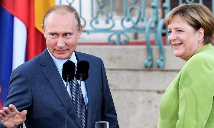 putin-merkel-agosto-efe.jpg
