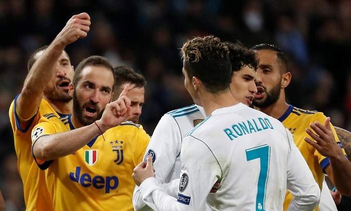 Higuain-discute-CR7-Chiellini-2018-Reuters.jpg