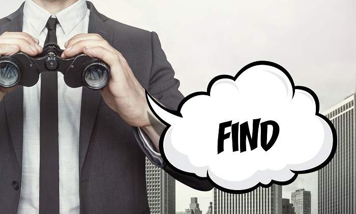 ejecutivo-prismaticos-find-dreamstime.jpg