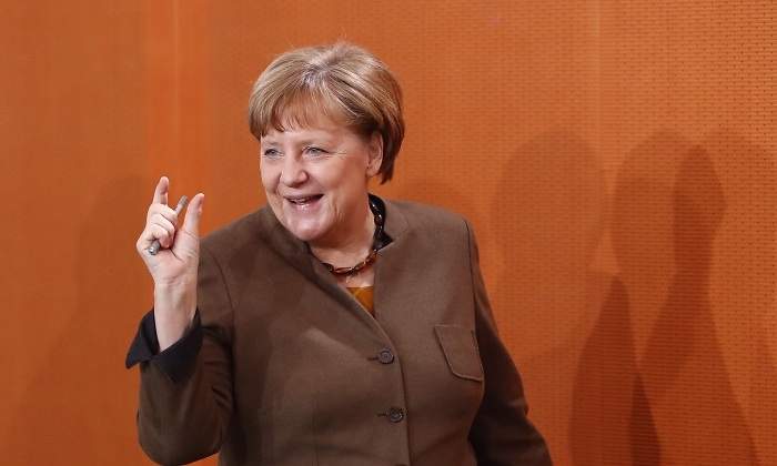 merkel-mano-rie.jpg
