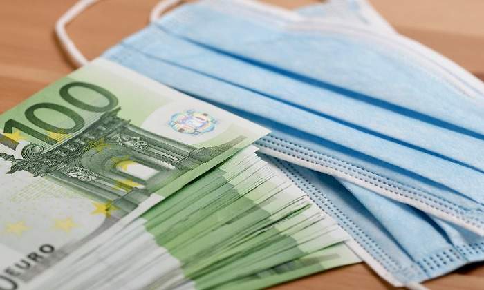 face-mask-and-100-euro-banknotes-trading-concept-during-corona-virus-picture-id1220810629.jpg