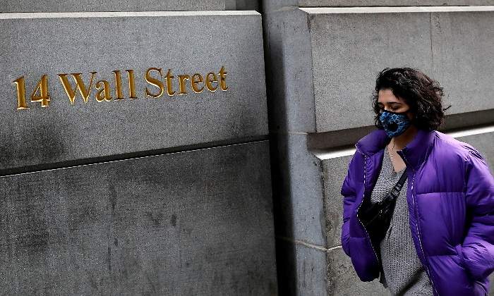 wall-street-letras-mujer-mascarilla-reuters-770x420.jpg