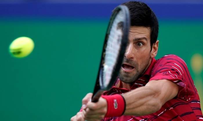 djokovic-isner-shanghai-reuters.jpg