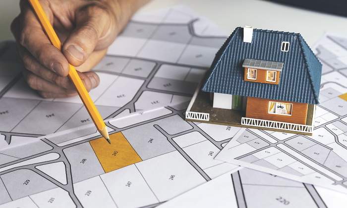 comprar-un-terreno-dreamstime.jpg