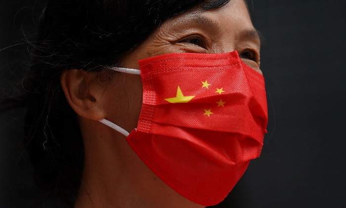 mujer-mascarilla-coronavirus-covid-bandera-china-reuters-770x420.jpg