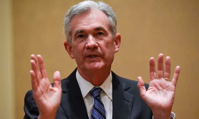 jerome-powell-manos-arriba.jpg