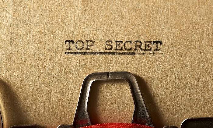 Un-folio-amarillento-con-la-frase-top-secret-iStock.jpg