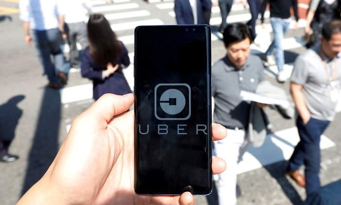 uber-logo-telefono-calle-reuters.jpg