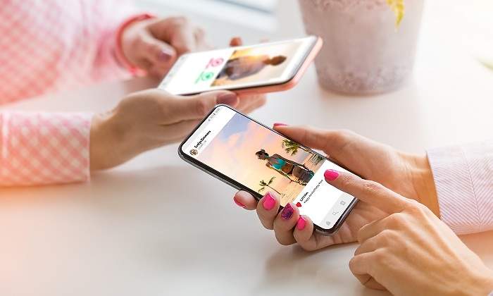Personas-mirando-una-foto-de-Instagram-iStock.jpg