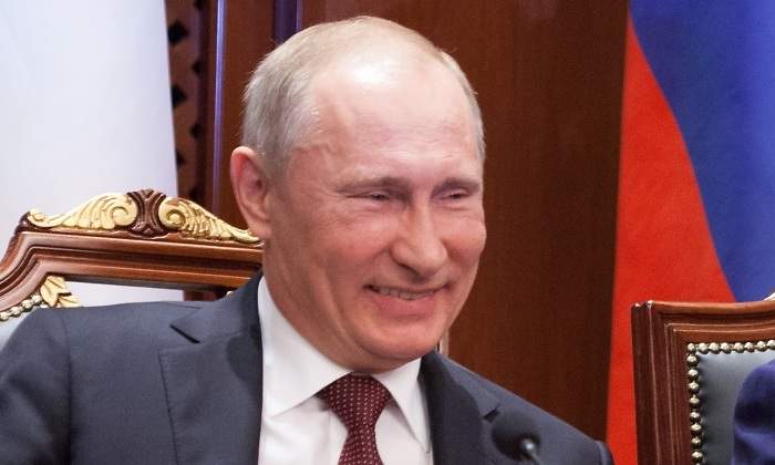 putin-rie-opep.jpg