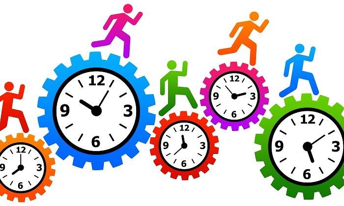 trabajadores-relojes-dreamstime.jpg