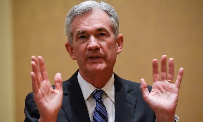 jerome-powell-manos-arriba.jpg