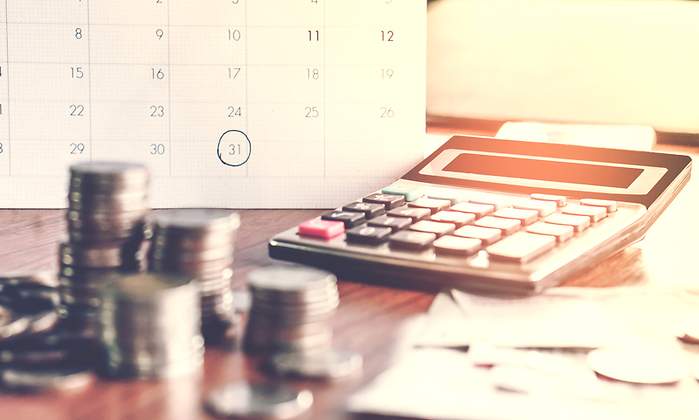 calendario-calculadora-monedas-dreamstime.jpg