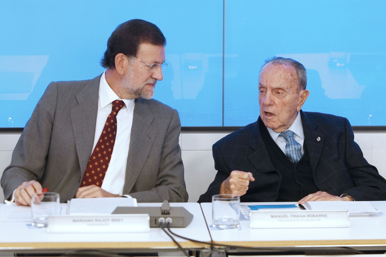 Manuel Fraga con Mariano Rajoy durante una reunión